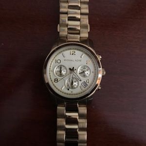 Gold women’s Michael Kota Watch